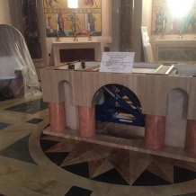 Altar designed by CUA students for the Pope’s Mass sits in the Basilica where it is being finished.