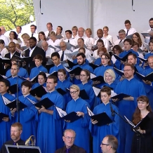 Choir members sing at the Papal Mass.