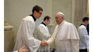 Junior Joe Cihak shakes hands with Pope Francis before serving as his altar service during a Mass in Rome this Spring. 