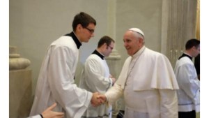 Junior Joe Cihak shakes hands with Pope Francis before serving as his altar service during a Mass in Rome this Spring.