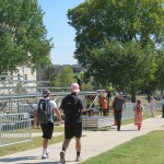 Students walk by construction