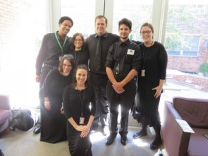 Members of the CUA Symphony Orchestra are seen in Ward Hall hours before the Papal Mass. 