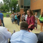 Students line up outside the Pryzbyla University Center to receive tickets to view Pope Francis's address to Congress at the Capital.