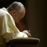 Pope Francis at prayer.