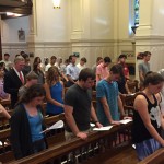 Members of the University community, including University President John Garvey, participate in a Spanish-language Mass Sept. 15 at Caldwell Chapel.