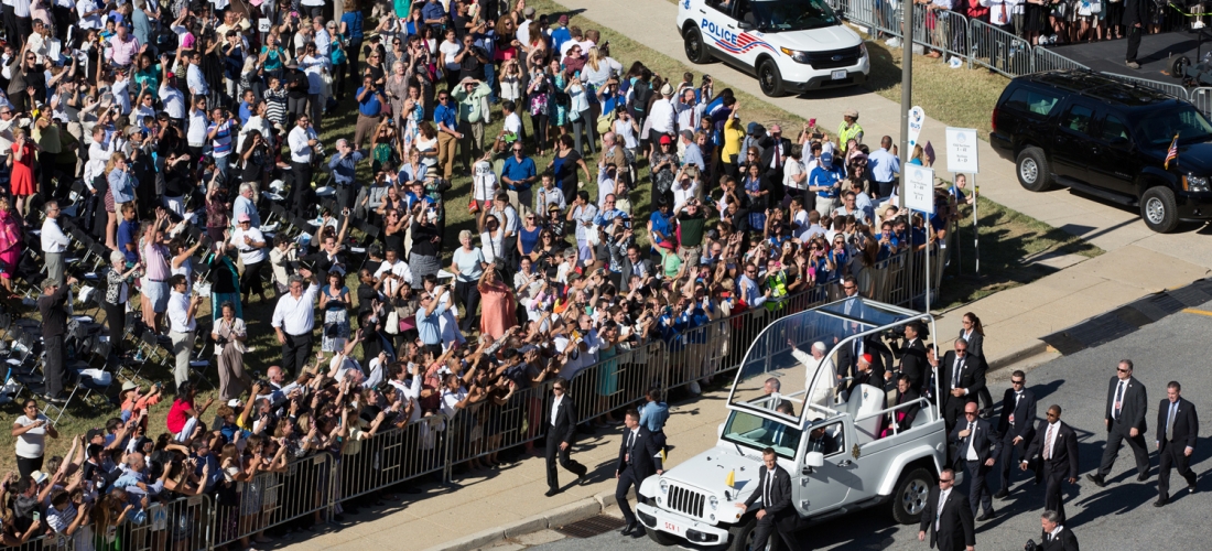 The Popemobile driving through CUA’s Campus