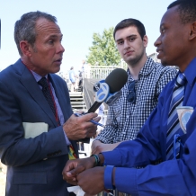 CBS News reporter interviews a CUA student