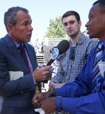 CBS News reporter interviews a CUA student