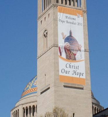 A banner on the bell tower of the Basilica of the National Shrine of the Immaculate Conception welcomes Pope Benedict XVI in 2008.