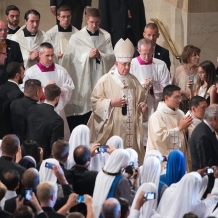 Pope Francis processing from inside the Basilica to the altar outside