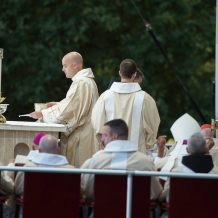 The deacon prepares the altar for the Liturgy of the Eucharist