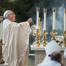 Pope Francis incenses the altar