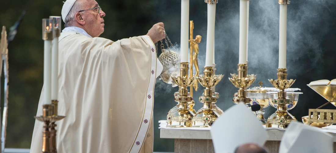 Pope Francis incenses the altar