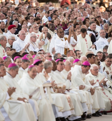 Bishops and priests who concelebrated the Mass seated in front of the altar