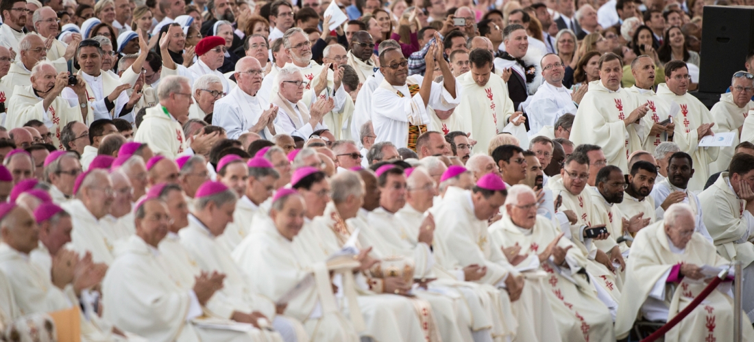 Bishops and priests who concelebrated the Mass seated in front of the altar