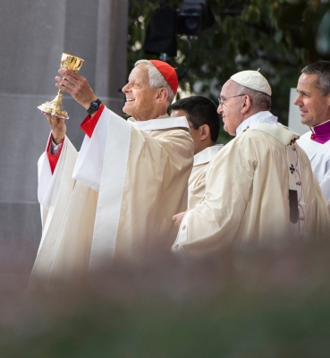 Cardinal Wuerl presents a gift to Pope Francis