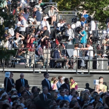 Media gathered on the riser directly across the University Mall from the papal altar.