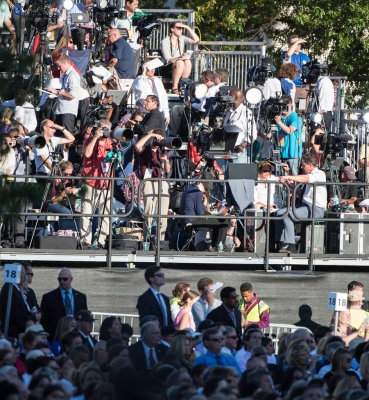 Media gathered on the riser directly across the University Mall from the papal altar.