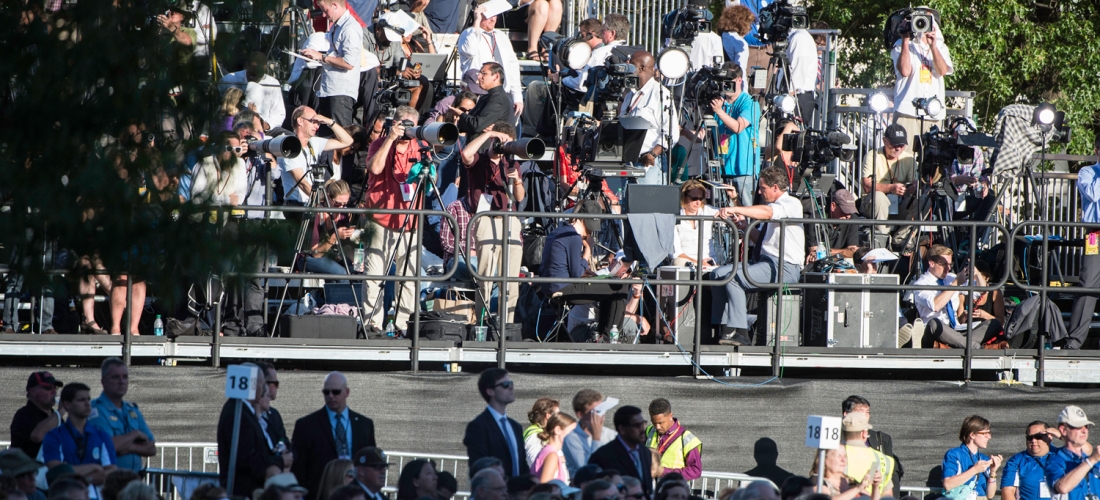 Media gathered on the riser directly across the University Mall from the papal altar.