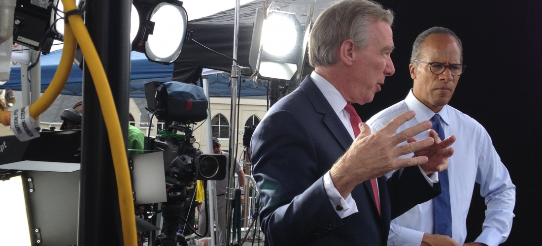 NBC News anchor Lester Holt with CUA President John Garvey in the rooftop studio.