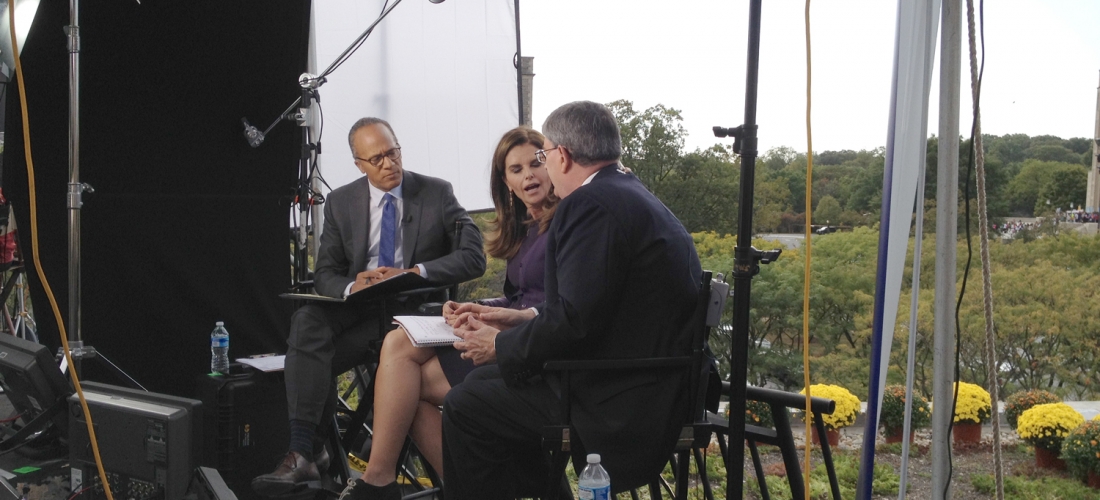 NBC News team conducting and interview on the roof of Father O’Connell Hall.