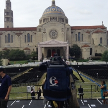 An ABC camera operator checks out the view of the altar from the media riser.