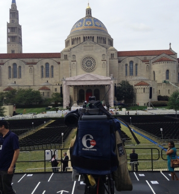 An ABC camera operator checks out the view of the altar from the media riser.