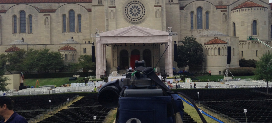 An ABC camera operator checks out the view of the altar from the media riser.