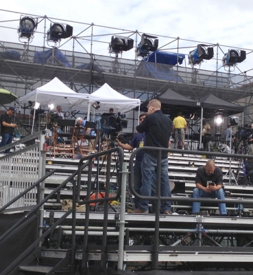 Media setting up on the 10-tier riser on the University Mall