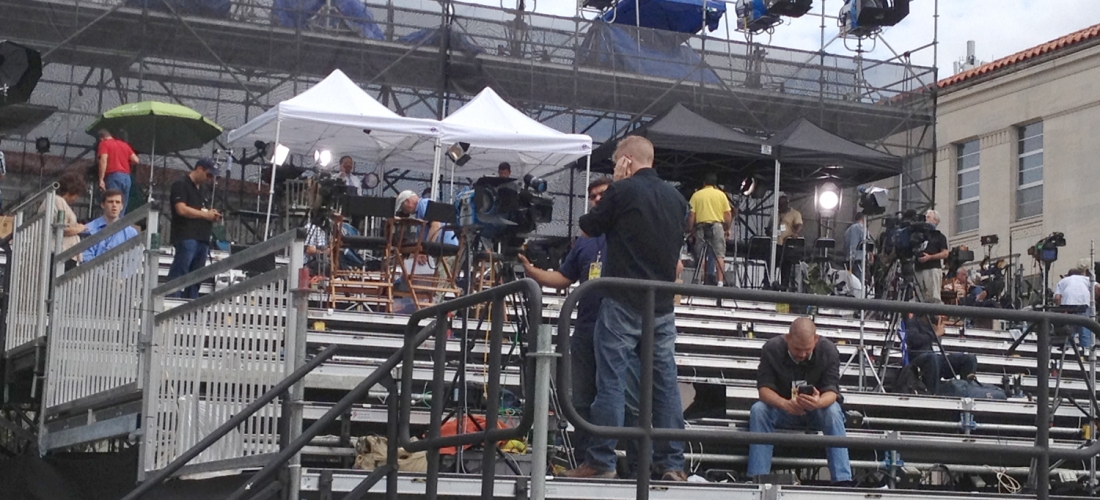 Media setting up on the 10-tier riser on the University Mall