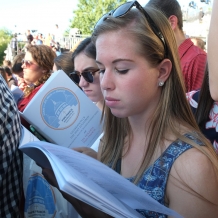 Students participate in the Mass, which was mostly in Spanish, using the bilingual Mass Program.