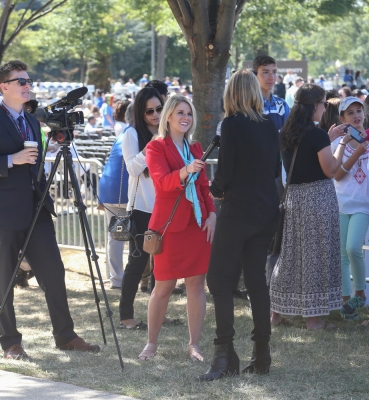 One of the many times TV reporters interviewed people at the Mass