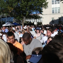 Thousands stood for hours on a warm, sunny day for their chance to participate in the papal Mass.