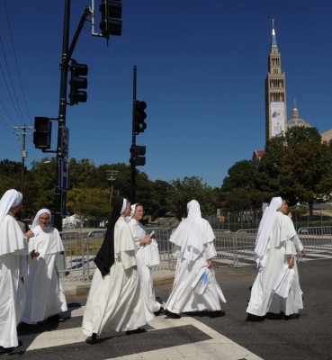 Dominican Sisters Crossing the Street to Attend the Papal Mass