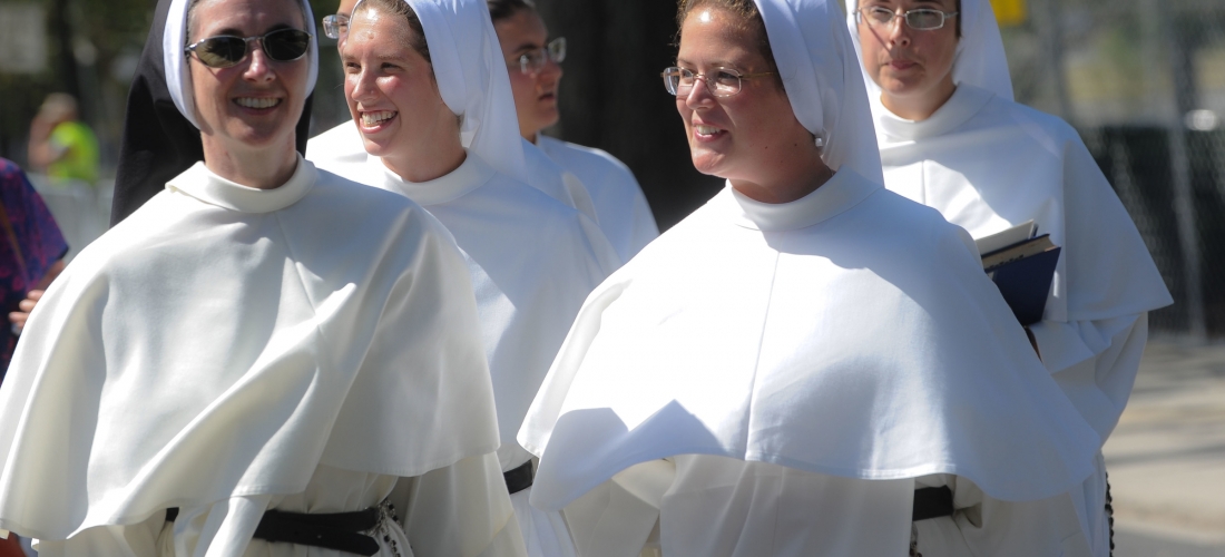 Sisters Walking to Mass