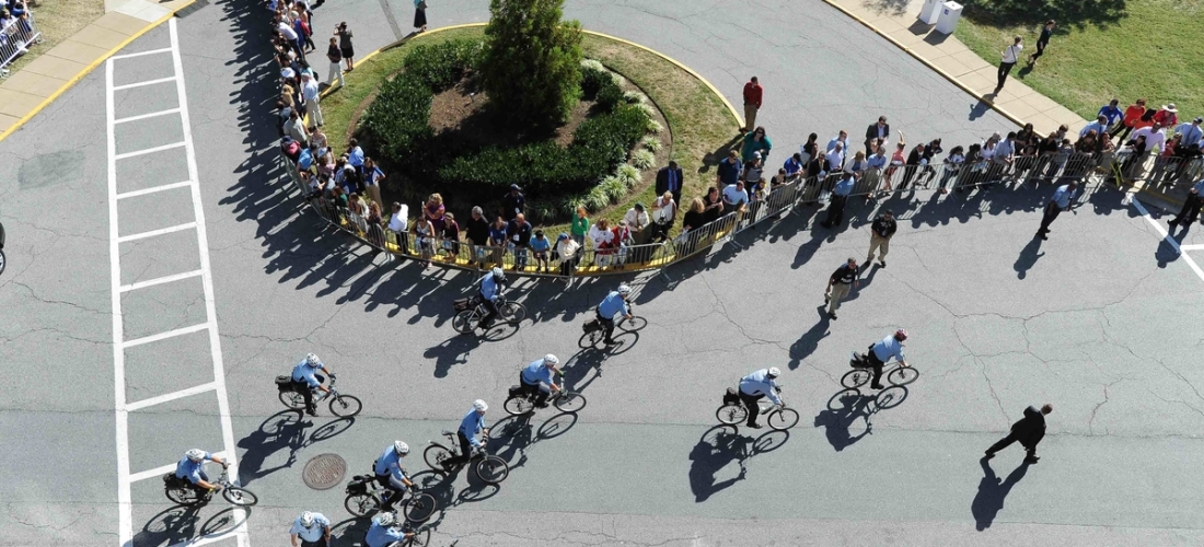 Police Cycling in front of McMahon Hall