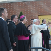 Pope Benedict XVI waves to CUA students from the east entrance of the Edward J. Pryzbyla University Center on April 17, 2008