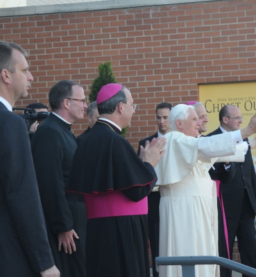 Pope Benedict XVI waves to CUA students from the east entrance of the Edward J. Pryzbyla University Center on April 17, 2008