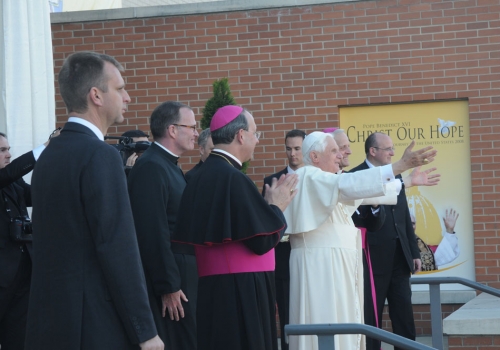 Pope Benedict XVI waves to CUA students from the east entrance of the Edward J. Pryzbyla University Center on April 17, 2008