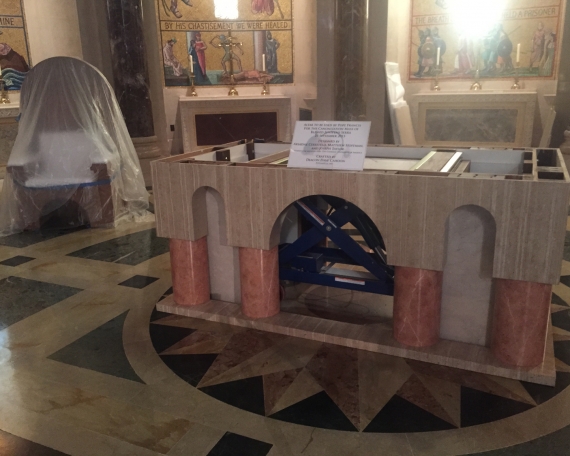 Altar designed by CUA students for the Pope’s Mass sits in the Basilica where it is being finished.