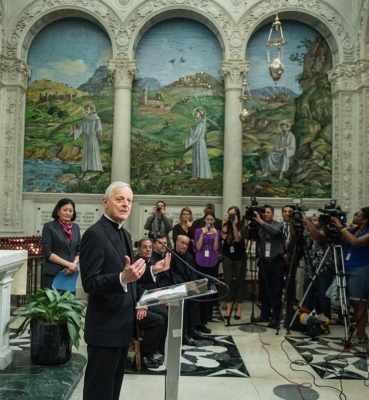 Cardinal Donald Wuerl, archbishop of Washington and chancellor of The Catholic University of America, announces the Pope’s schedule to the media.