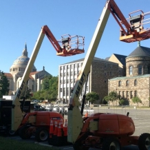 Construction equipment was moved into McMahon parking lot on Monday to begin getting ready for the Pope’s visit.