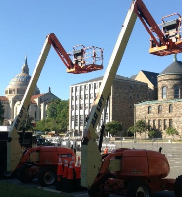 Construction equipment was moved into McMahon parking lot on Monday to begin getting ready for the Pope’s visit.