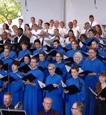 Choir members sing at the Papal Mass.