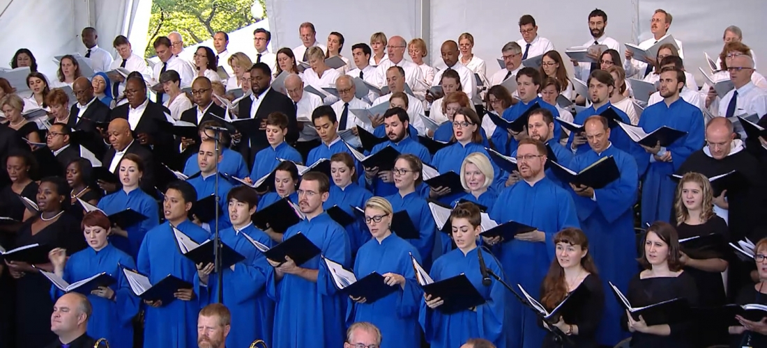 Choir members sing at the Papal Mass.