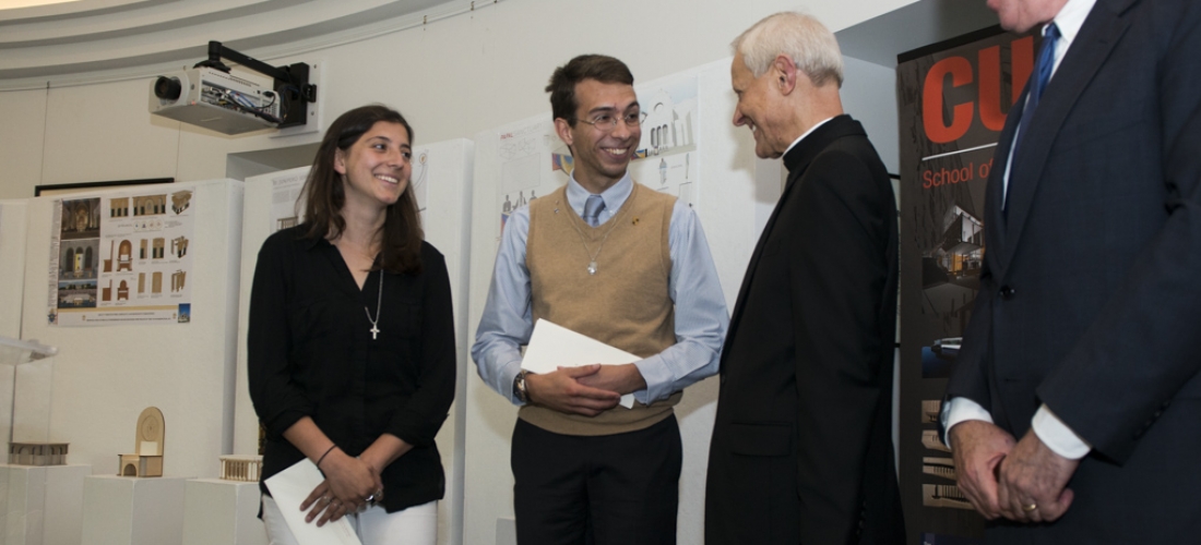 Cardinal Donald Wuerl congratulates the winning design team