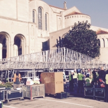 Preparing to raise the roof over the papal altar.