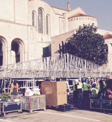 Preparing to raise the roof over the papal altar.