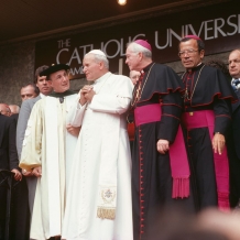 POPE JOHN PAUL II SPEAKS WITH THEN-PRESIDENT OF CATHOLIC UNIVERSITY EDMUND D. PELLEGRINO DURING HIS VISIT IN 1979.