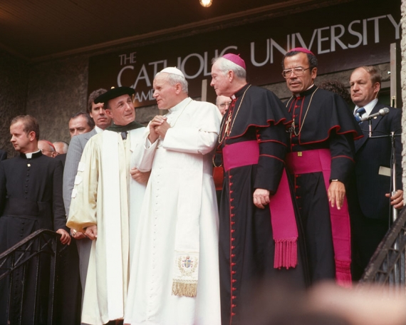 POPE JOHN PAUL II SPEAKS WITH THEN-PRESIDENT OF CATHOLIC UNIVERSITY EDMUND D. PELLEGRINO DURING HIS VISIT IN 1979.